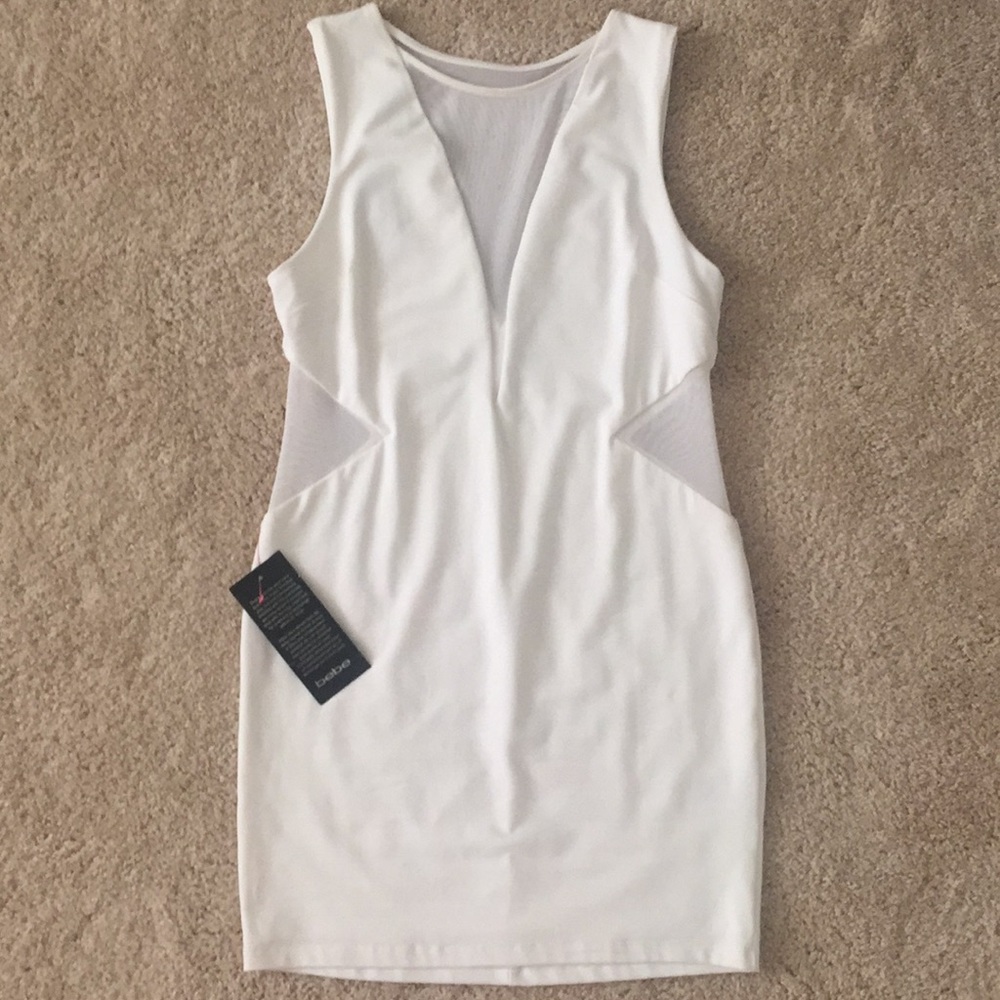 White fitted dress with mesh cut outs